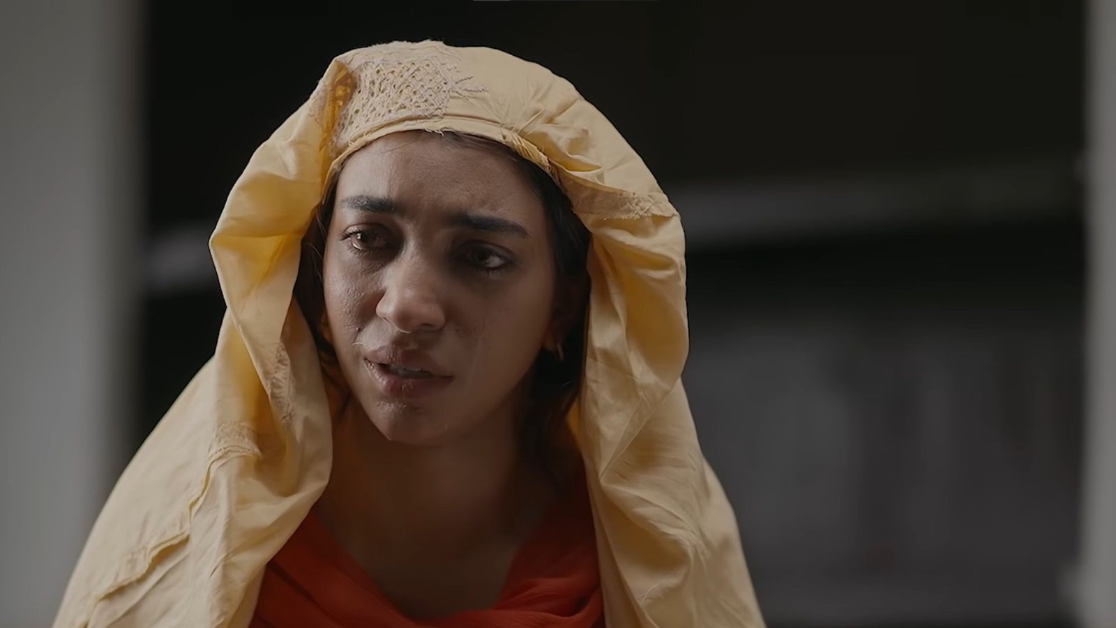 Close-up of a woman wearing a yellow dupatta in Aap Ki Izzat