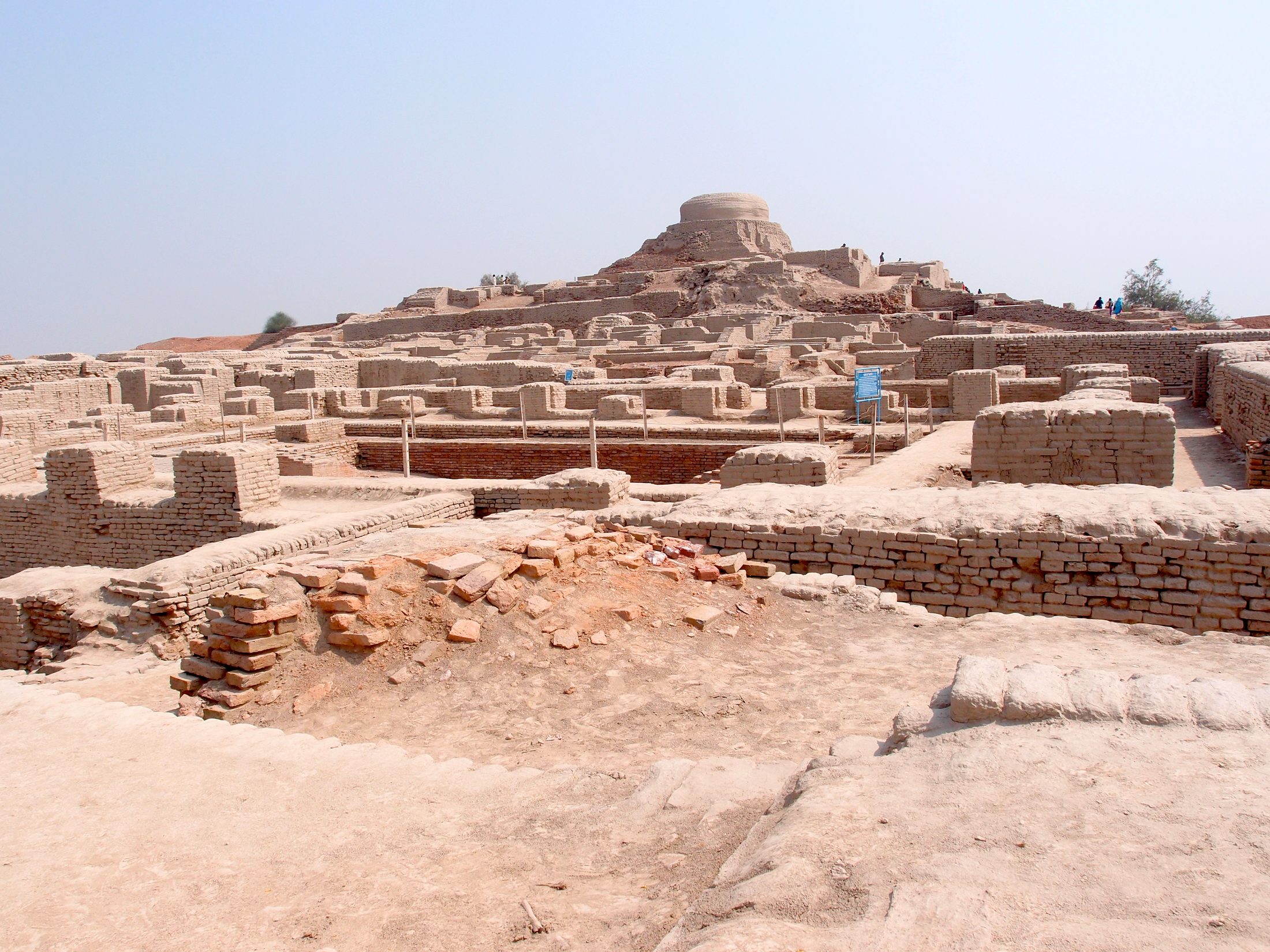 The stupa mound and excavated brick ruins at Moenjodaro in Sindh