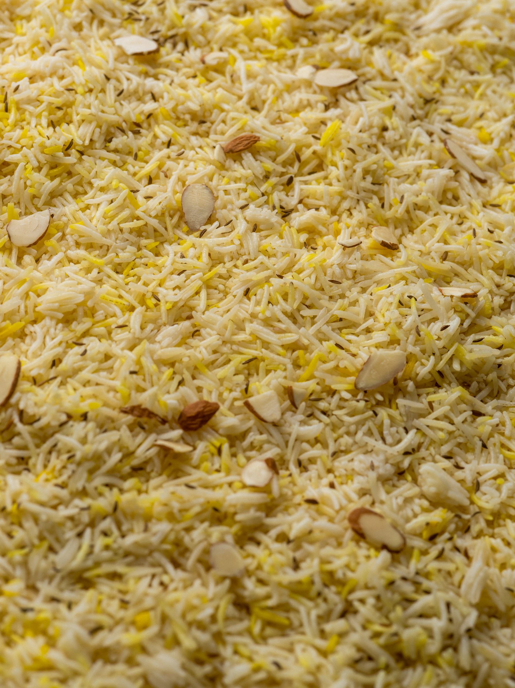 Separate rice grains showing the texture to aim for in rice-led Pakistani cooking.