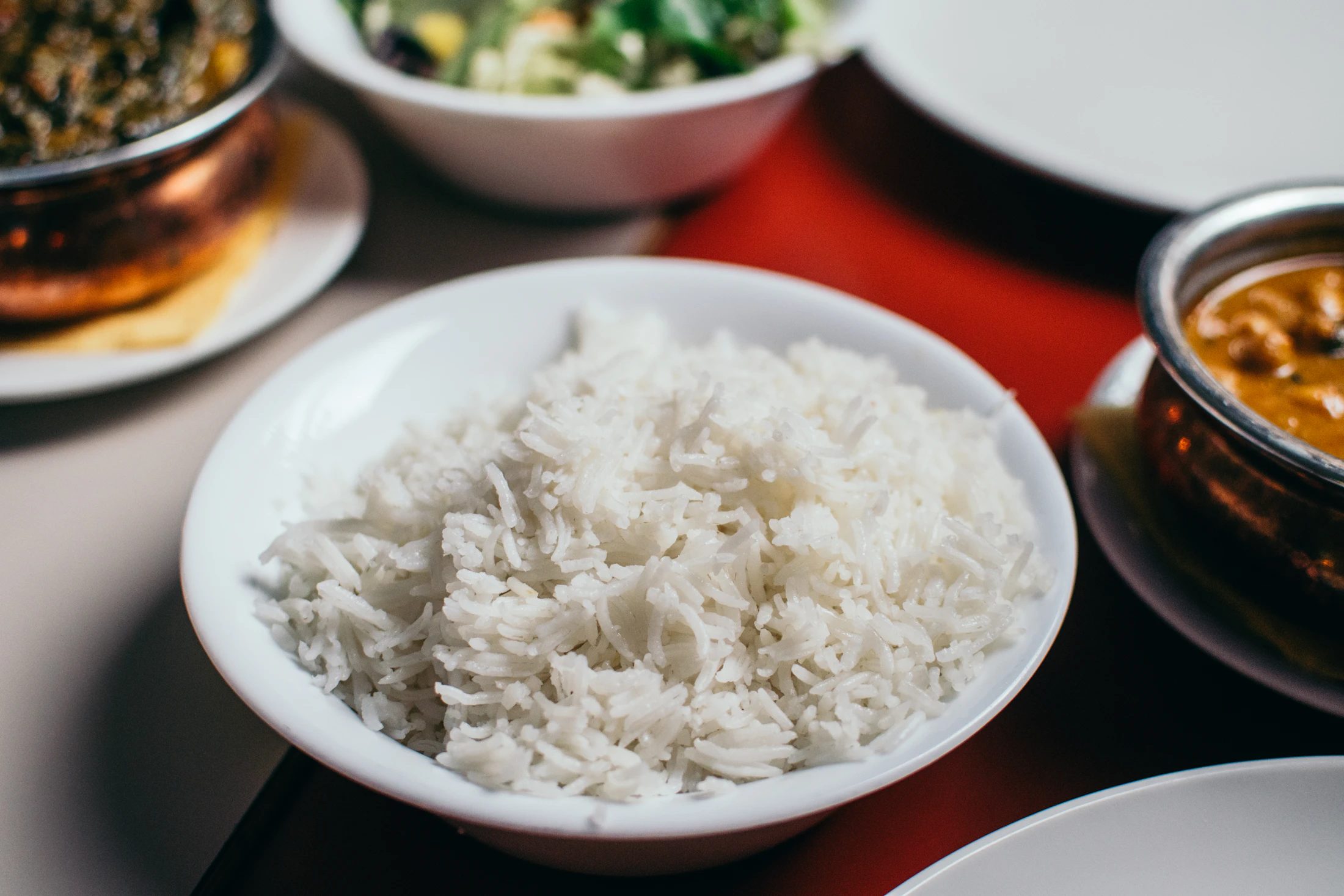Long-grain rice prepared in a bowl.